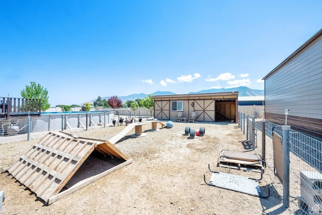 4390 N Diamond Ln, Erda, UT 84074 - view of yard featuring a mountain view and an outbuilding