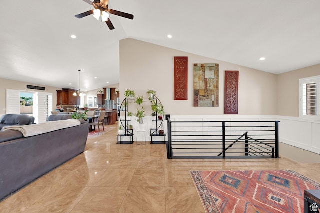 4390 N Diamond Ln, Erda, UT 84074 - living area featuring lofted ceiling, ceiling fan, healthy amount of natural light, recessed lighting, and light marble finish flooring