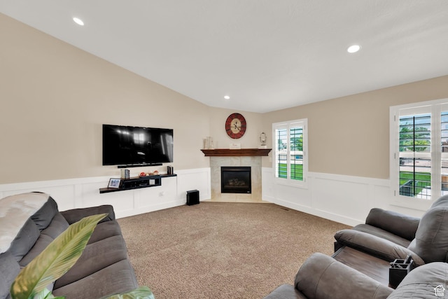 4390 N Diamond Ln, Erda, UT 84074 - living area with wainscoting, carpet, recessed lighting, a tile fireplace, and a decorative wall