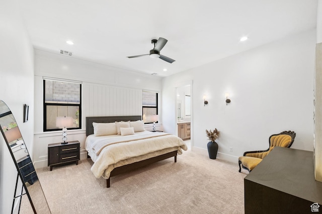 2950 E Naboo Ln, St George, UT 84790 - bedroom with light colored carpet, ceiling fan, recessed lighting, and ensuite bath