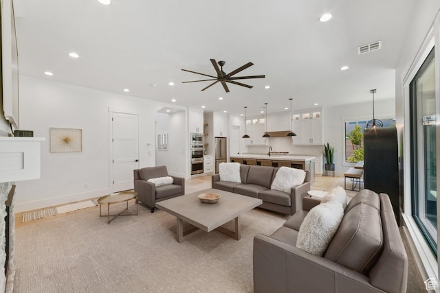 2950 E Naboo Ln, St George, UT 84790 - living area featuring a ceiling fan and recessed lighting