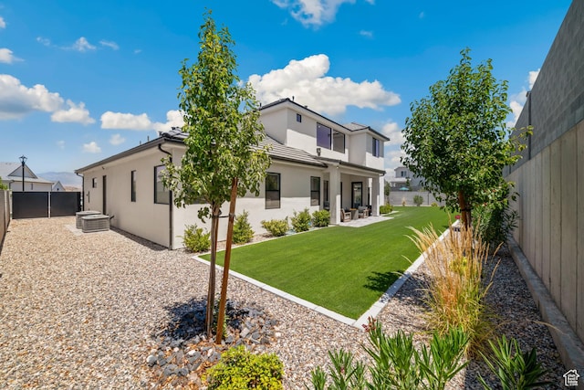 2950 E Naboo Ln, St George, UT 84790 - rear view of house featuring stucco siding, a fenced backyard, and a patio