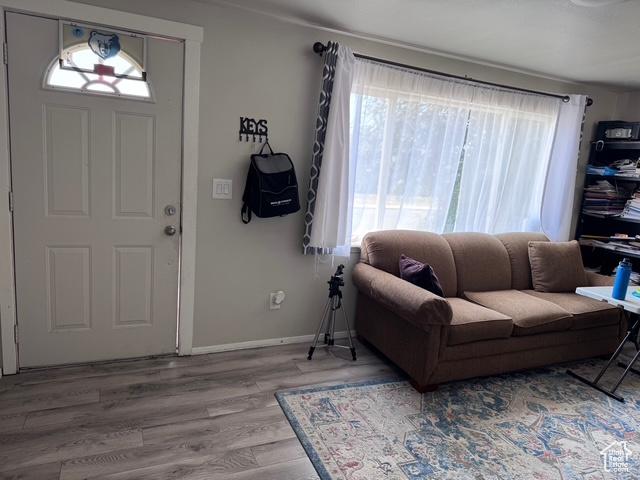 54 W 300 S, Orem, UT 84058 - foyer entrance featuring light wood-type flooring and baseboards