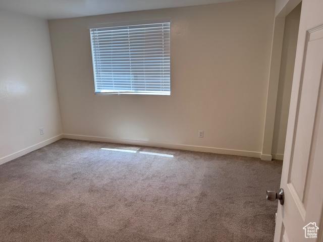 54 W 300 S, Orem, UT 84058 - carpeted spare room with baseboards