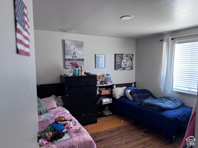 54 W 300 S, Orem, UT 84058 - bedroom with multiple windows and wood finished floors