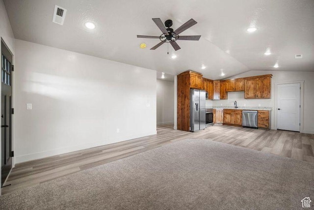 775 E 100 N Unit 83, Enterprise, UT 84725 - kitchen featuring stainless steel appliances, light wood-style flooring, lofted ceiling, light countertops, and a ceiling fan