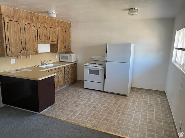 275 N 100 W Unit 1-6, Spanish Fork, UT 84660 - kitchen with white appliances, brown cabinetry, and light countertops