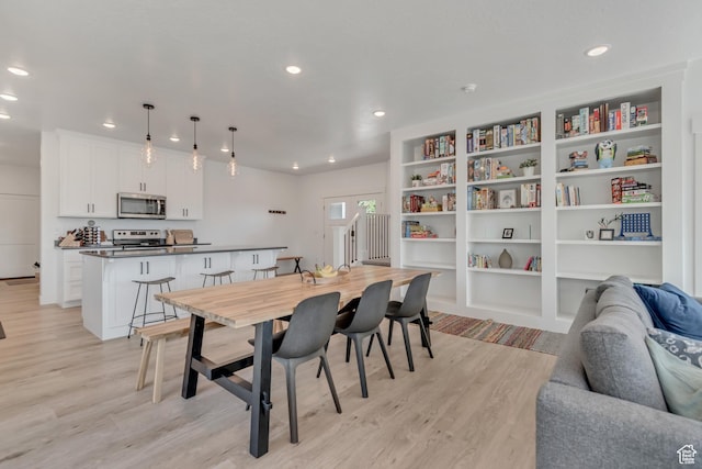 1058 W 570 N, Orem, UT 84057 - dining room with light wood-style floors, recessed lighting, and built in features