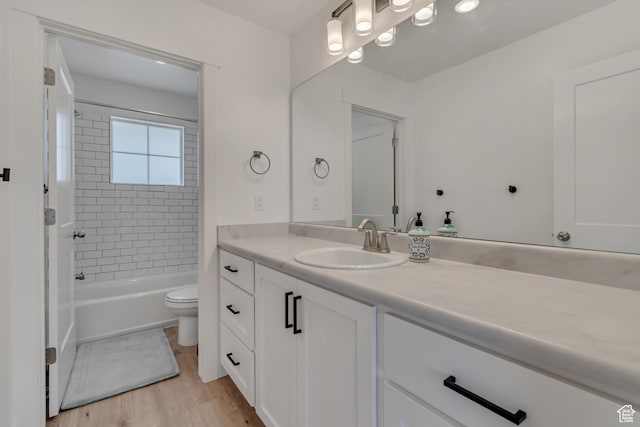 1058 W 570 N, Orem, UT 84057 - bathroom with vanity, wood finished floors, and tub / shower combination