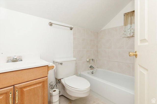 14360 N 6000 W, Garland, UT 84312 - bathroom with tile patterned floors, vanity, lofted ceiling, and bathtub / shower combination