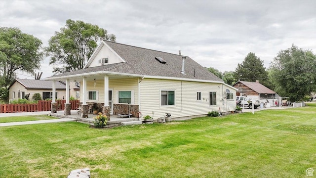 14360 N 6000 W, Garland, UT 84312 - back of house featuring a shingled roof
