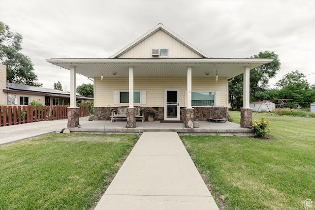 14360 N 6000 W, Garland, UT 84312 - back of property featuring a porch and stone siding