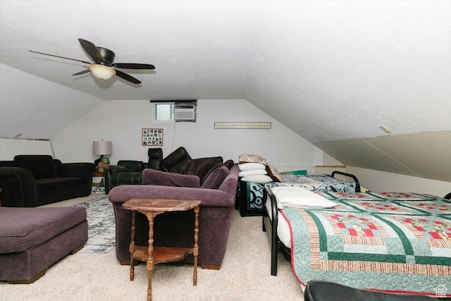 14360 N 6000 W, Garland, UT 84312 - carpeted bedroom with lofted ceiling, a ceiling fan, and a wall mounted air conditioner