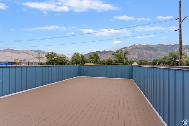 2835 Lincoln Ave, Ogden, UT 84401 - wooden deck featuring a mountain view