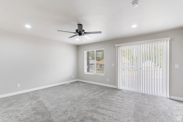 2835 Lincoln Ave, Ogden, UT 84401 - carpeted empty room with a smoke detector, ceiling fan, recessed lighting, and a textured ceiling
