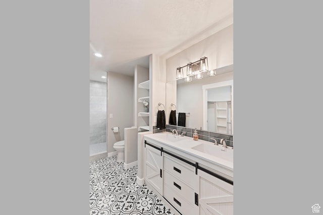 2835 Lincoln Ave, Ogden, UT 84401 - bathroom with double vanity, tiled shower, tile patterned floors, and recessed lighting