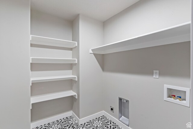 2835 Lincoln Ave, Ogden, UT 84401 - laundry area featuring washer hookup, electric dryer hookup, and tile patterned flooring