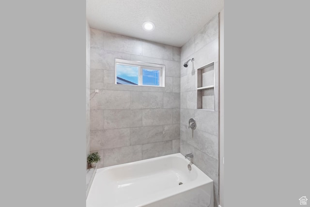 2835 Lincoln Ave, Ogden, UT 84401 - full bathroom with a textured ceiling and shower / tub combination