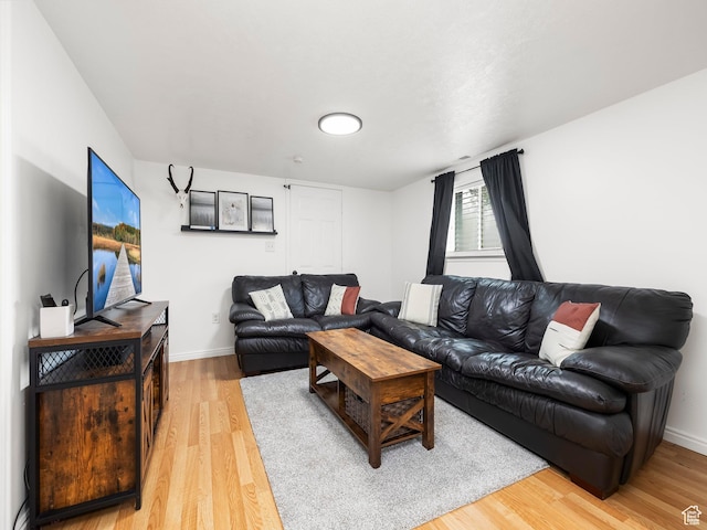 188 E 100 S, Santaquin, UT 84655 - living room with light wood-type flooring and baseboards