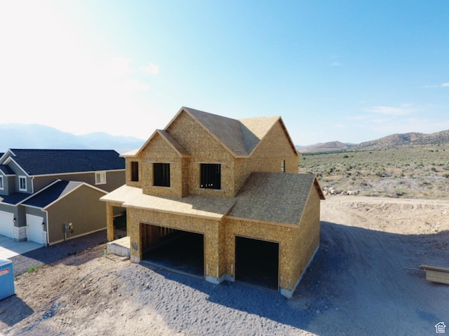 2957 E Clarkstone Dr, Eagle Mountain, UT 84005 - property in mid-construction featuring a garage and a mountain view