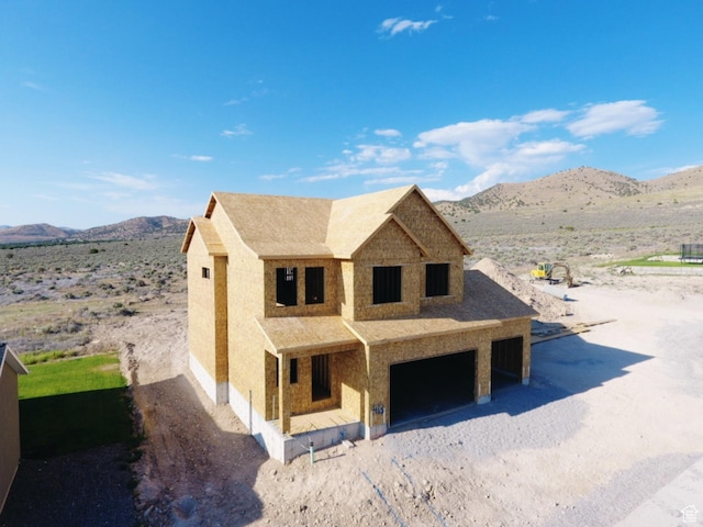 2957 E Clarkstone Dr, Eagle Mountain, UT 84005 - unfinished property with a mountain view and an attached garage
