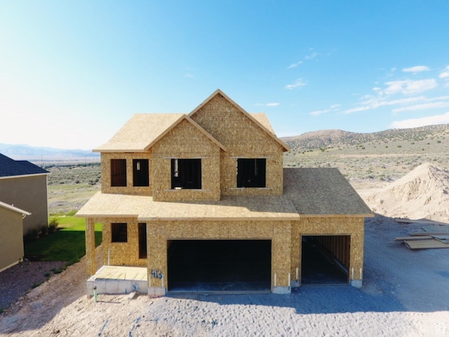 2957 E Clarkstone Dr, Eagle Mountain, UT 84005 - property under construction featuring an attached garage and a mountain view