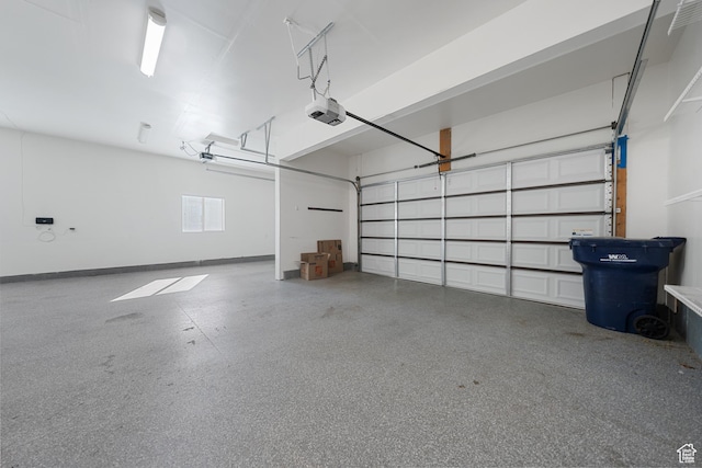 488 N 1375 E, Layton, UT 84040 - garage featuring a garage door opener and baseboards