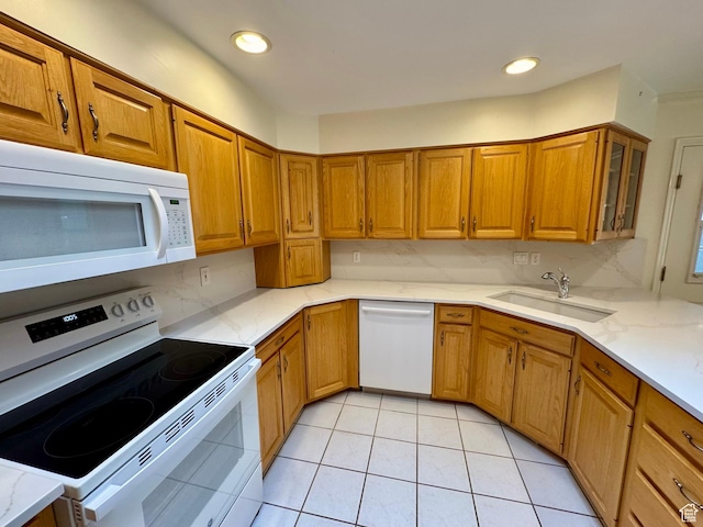 1341 E 5200 S, South Ogden, UT 84403 - kitchen with white appliances, brown cabinets, light stone countertops, glass insert cabinets, and recessed lighting