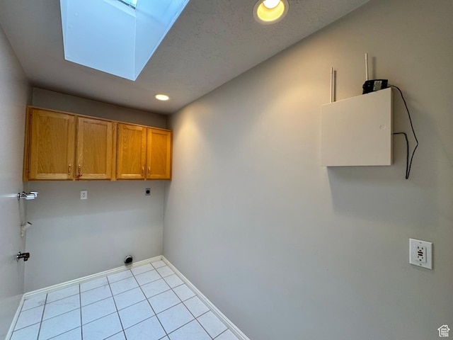 1341 E 5200 S, South Ogden, UT 84403 - laundry room featuring cabinet space, a skylight, hookup for an electric dryer, tile patterned floors, and recessed lighting
