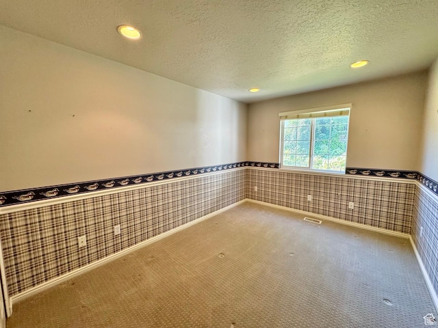 1341 E 5200 S, South Ogden, UT 84403 - empty room featuring carpet, recessed lighting, a wainscoted wall, and a textured ceiling
