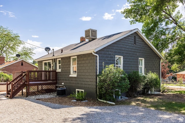 190 N 200 E, Pleasant Grove, UT 84062 - view of side of home with a wooden deck, a chimney, and a shingled roof