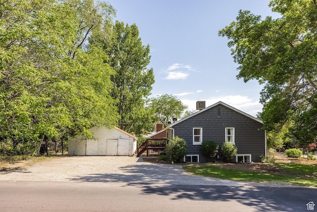190 N 200 E, Pleasant Grove, UT 84062 - view of side of home featuring an outdoor structure and a chimney