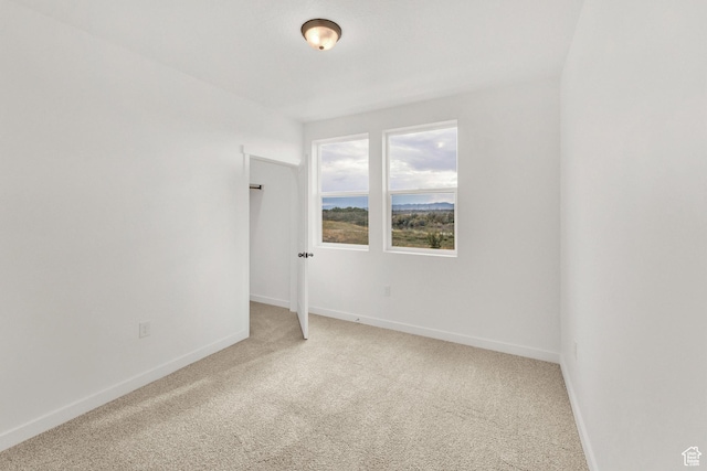 736 W Blue Magic Ln S Unit R201, Midvale, UT 84047 - unfurnished room with light carpet and baseboards