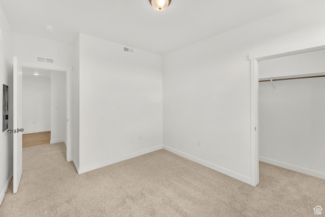 736 W Blue Magic Ln S Unit R201, Midvale, UT 84047 - unfurnished bedroom featuring light colored carpet and a closet