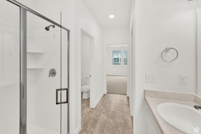 736 W Blue Magic Ln S Unit R201, Midvale, UT 84047 - bathroom featuring a shower stall, vanity, and recessed lighting