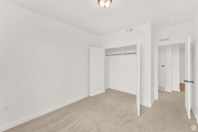 736 W Blue Magic Ln S Unit R201, Midvale, UT 84047 - unfurnished bedroom with light carpet and a closet