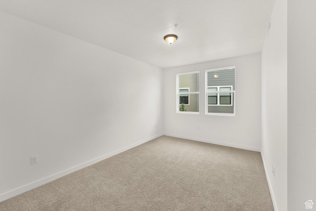 736 W Blue Magic Ln S Unit R201, Midvale, UT 84047 - spare room with carpet flooring and baseboards