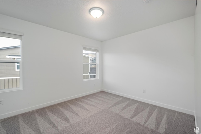2522 N Wildwood Ln E Unit 240, Heber City, UT 84032 - carpeted empty room featuring plenty of natural light