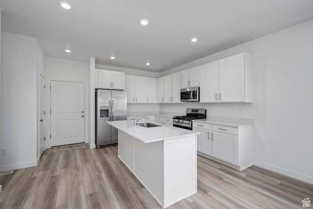 2522 N Wildwood Ln E Unit 240, Heber City, UT 84032 - kitchen with appliances with stainless steel finishes, white cabinetry, light wood-style floors, light countertops, and recessed lighting