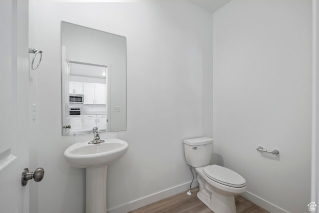 2522 N Wildwood Ln E Unit 240, Heber City, UT 84032 - half bath featuring wood finished floors and toilet