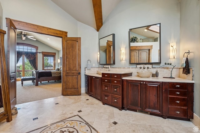 7881 N W Hills Trl, Park City, UT 84098 - bathroom featuring lofted ceiling, ensuite bath, double vanity, ceiling fan, and decorative backsplash