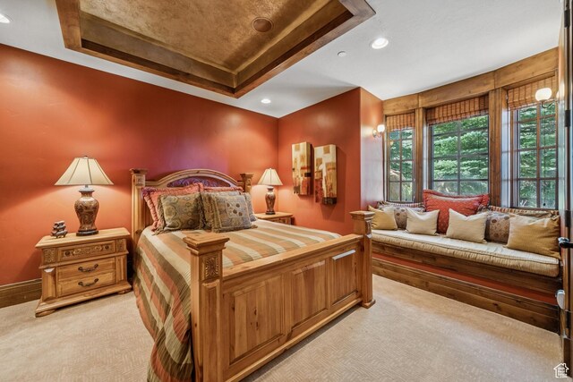 7881 N W Hills Trl, Park City, UT 84098 - bedroom featuring a raised ceiling, light colored carpet, and recessed lighting
