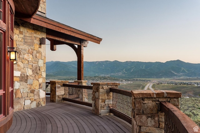7881 N W Hills Trl, Park City, UT 84098 - deck at dusk with a mountain view