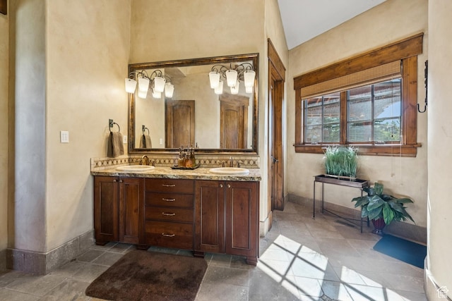7881 N W Hills Trl, Park City, UT 84098 - bathroom featuring double vanity and baseboards