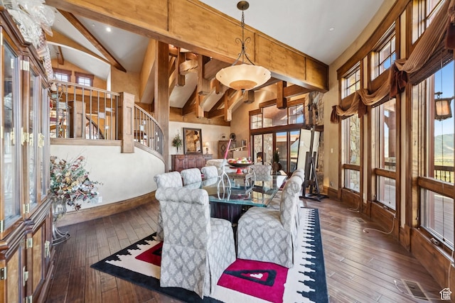 7881 N W Hills Trl, Park City, UT 84098 - dining room with beamed ceiling, hardwood / wood-style floors, high vaulted ceiling, and stairway