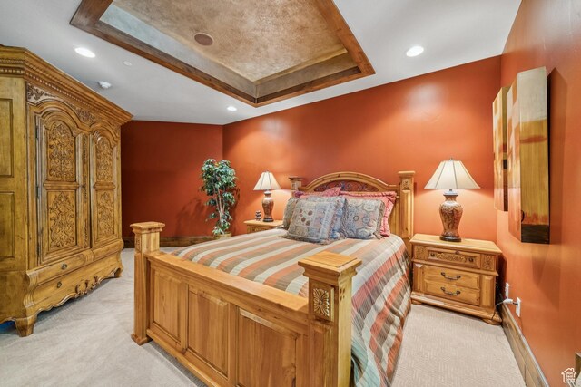 7881 N W Hills Trl, Park City, UT 84098 - bedroom with light colored carpet, a raised ceiling, and recessed lighting