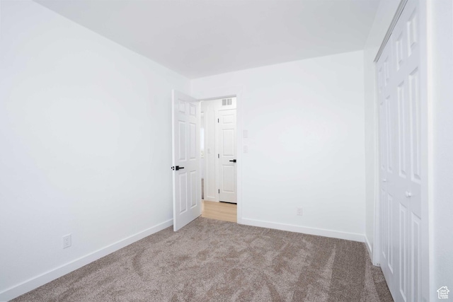 3189 S 4000 W, Roosevelt, UT 84066 - unfurnished bedroom with a closet and carpet flooring