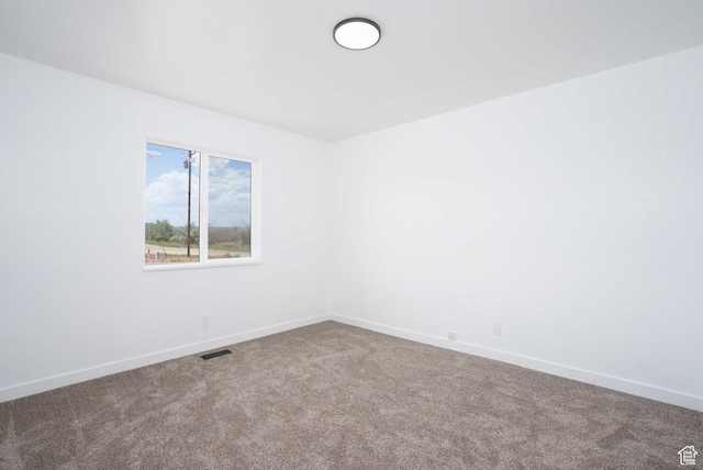3189 S 4000 W, Roosevelt, UT 84066 - spare room featuring carpet and baseboards