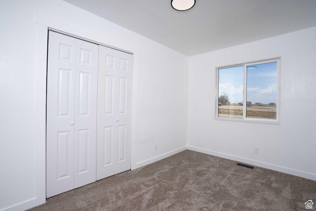 3189 S 4000 W, Roosevelt, UT 84066 - unfurnished bedroom with carpet and a closet