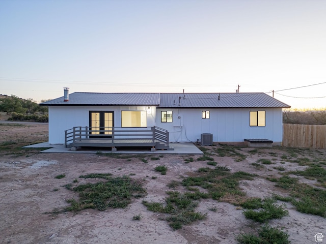 3189 S 4000 W, Roosevelt, UT 84066 - back of property at dusk with a metal roof and a deck